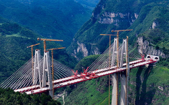 天堑变通途 鉴黑担保网群塔铸就“云端桥塔